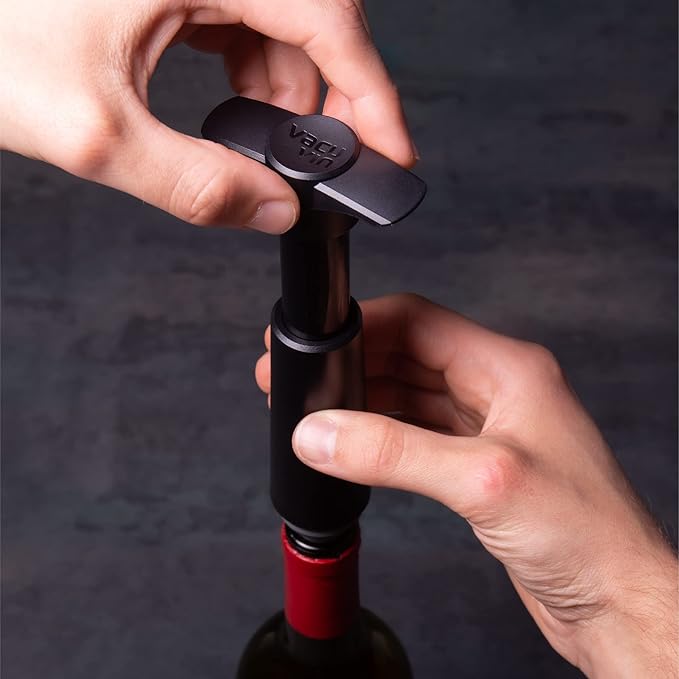 Vacu Vin Wine Saver Pump Pink with Vacuum Wine Stopper - Keep Your Wine Fresh for up to 10 Days - 1 Pump 8 Stoppers - Reusable - Made in the Netherlands